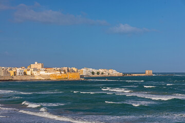 Fototapeta na wymiar mediterranean sea waterfront and old town in Trapani in Sicily