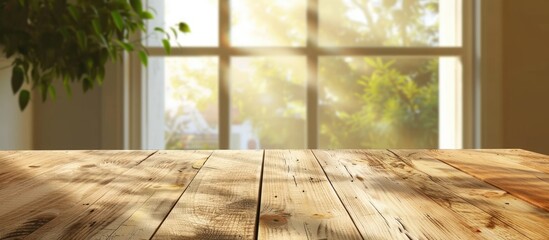 A light wooden textured table against a blurred summer window background. - obrazy, fototapety, plakaty