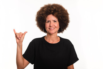 Female interpreter of the Brazilian sign language, Libras, making the letter Y.