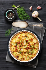 Irish potato pie with bacon in baking dish