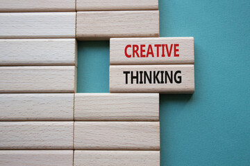 Creative thinking symbol. Wooden blocks with words Creative thinking. Beautiful grey green...