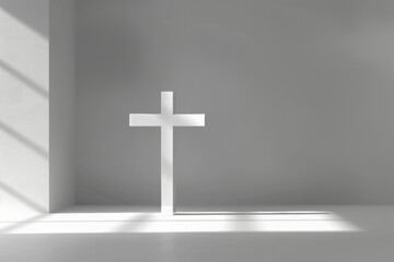 a white cross, with shadow, on a grey background