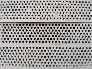 Blechhintergrund mit Löchern als Design Element - Metall Textur
