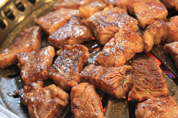 delicious grilled meat on barbecue
