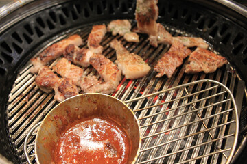 delicious grilled meat on barbecue