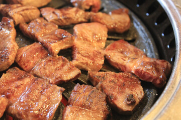 delicious grilled meat on barbecue