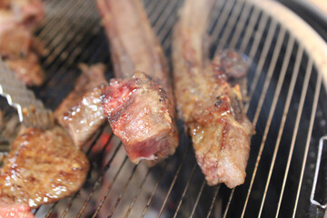 delicious grilled meat on barbecue