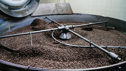 coffee beans background pattern of alot small brown coffee beans inside coffee beans big mixer at...
