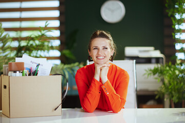 happy modern woman employee in modern green office