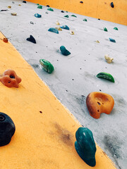 Bouldering wall with stones close up