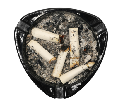 Black glass ashtray with cigarette stubs, butts with ash isolated on white background, top view
