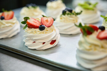 Crispy and airy meringue nests filled with fruit mousse