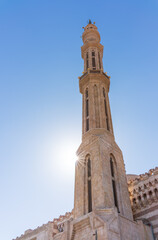 Fototapeta na wymiar Tower of Al Mustafa Mosque in Old Town of Sharm El Sheikh in Egypt, at sunset