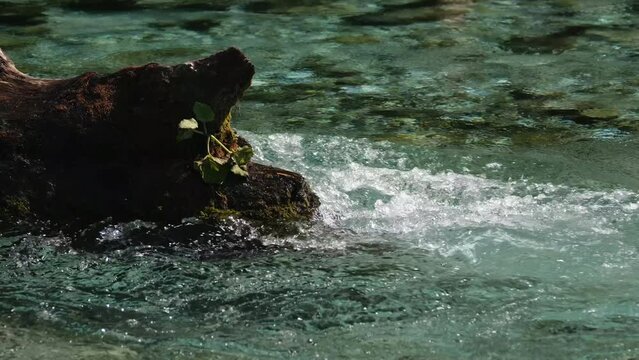 floating water of parwati river situated in kullu manikaran valley himachal pradesh india.
