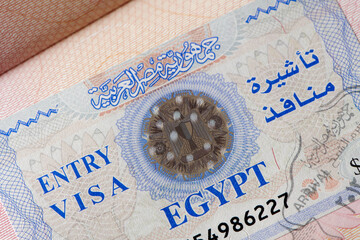 Egyptian Entry Visa stamp in pasport in Sinai Governorate. Travel and vacation in Egypt.