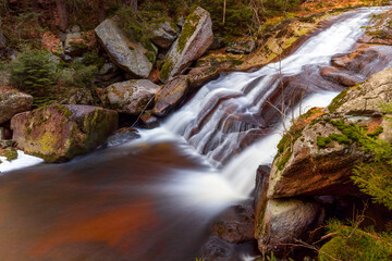 Beautiful view of the cascades of the river in the mountain valley