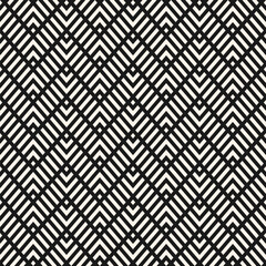 Geometric line seamless pattern. Vector chevron texture. Black and white zig zag stripes, grid, lattice, mesh, diagonal lines. Abstract minimal zigzag background. Simple geometry. Repeating design