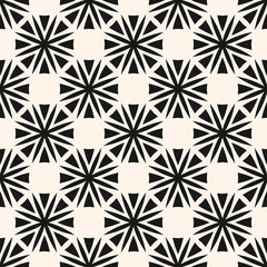 Simple vector geometric floral ornament. Abstract black and white seamless pattern with big flowers in modular grid. Stylish monochrome background texture. Repeated design for print, textile, fabric