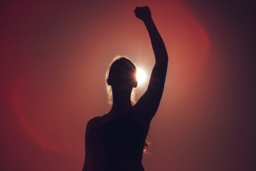 Strong confident woman, Winning and life goals concept, silhouette of a woman, fist in the air