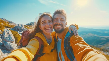 Happy couple woman and man taking selfie photo in hiking vacation time on the mountain