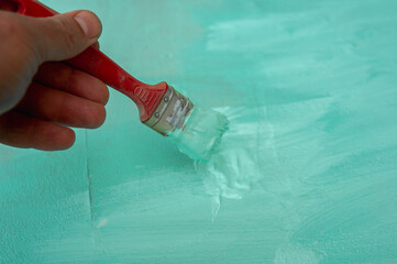 Decorator primer to Prime the walls before applying the plaster, repairs to the house, the second...