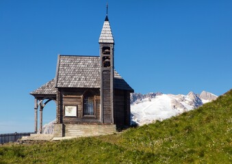 wooden church Mount Marmolada Alps Dolomites mountains