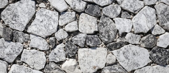 Fototapeta premium A pile of white and grey granite stones