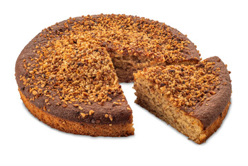 Hazelnut sponge cake cut with roasted hazelnut kernels on top and with slice, isolated