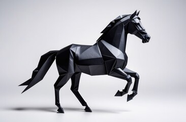 Black horse made of paper on a white background, origami.