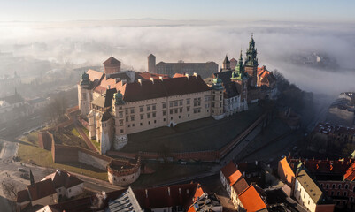 Wawel Castle during foggy sunrise, Krakow, Poland
