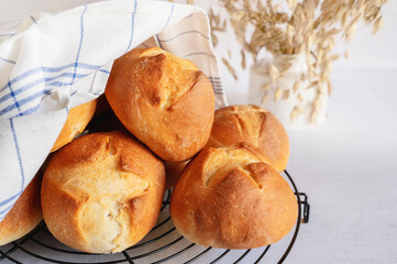 homemade buns. Homemade buns on wood board with wheat ears. Homemade Dinner Rolls, selective focus - 791133945