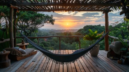 A hammock hangs on a wooden porch overlooking a jungle canopy at sunset.