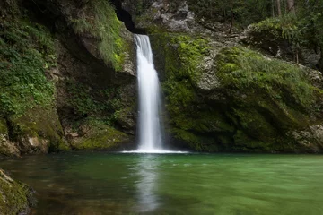 Fotobehang Secluded Waterfall Near Nomenj, Slovenia © Marcel Otterspeer