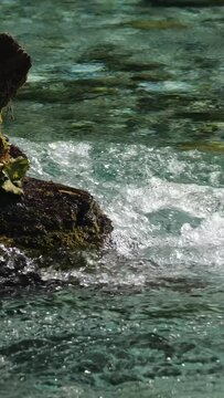 floating water of parwati river situated in kullu manikaran valley himachal pradesh india.