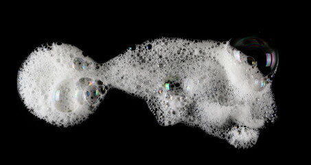 Soap foam, bubbles isolated on black, with clipping path, top view	