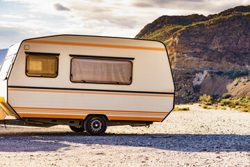 Caravan trailer in mountain nature