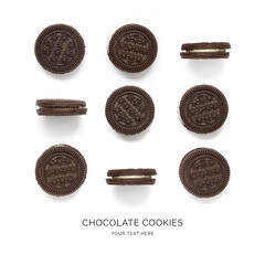 Creative layout made of chocolate cookies on the white background. Food concept. Macro concept.
