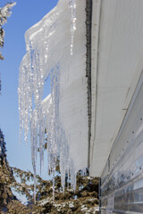 icicles hanging off a roof