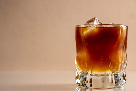 Espresso Tonic, cold drink with espresso and tonic in glass