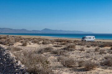 Sandy dunes and turquoise water of Sotavento beach, Costa Calma, Fuerteventura, Canary islands,...
