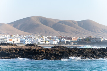 West coast of Fuerteventura island. Winter sea and sun vacation in El Cotillo touristic village,...