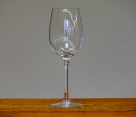 Empty crystal glass, isolated in selective focus