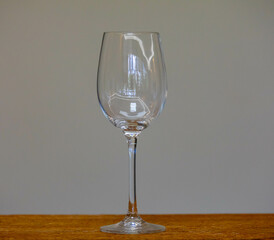 Empty crystal glass, isolated in selective focus