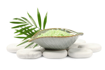 Green sea salt in bowl, spa stones and palm leaves isolated on white
