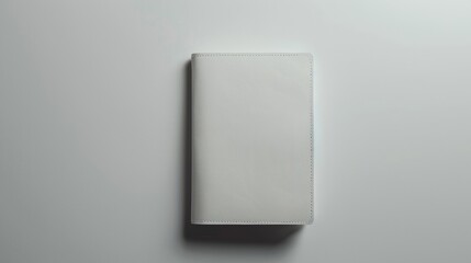 Minimalist white blank mockup of a passport holder with embossed detail .