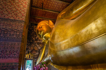 Beautiful gold statue of Reclining Buddha in Wat Pho Temple, Bangkok, Thailand - 791198593