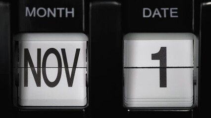 retro flip calendar with a date change from the thirtieth of November to the first of December. daily calendar with a change of days of the month. calendar concept, reminders, events. close up.
