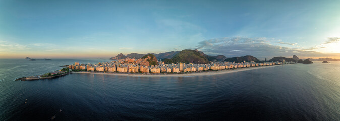 Aerial sunrise panorama of Copacabana Beach and skyline of Rio de Janeiro, Brazil