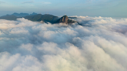 Aerial view of sea of clouds below Corcovado Hills and and other mountains, Rio de Janeiro