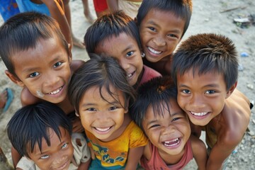 Group of asian children smiling at the camera with a happy face